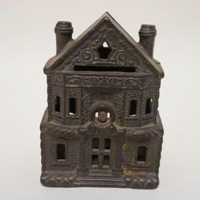 1010	BUILDING STILL BANK, 2 CHIMNEYS, CAST IRON, 3 1/4 IN WIDE X 4 1/2 IN HIGH
