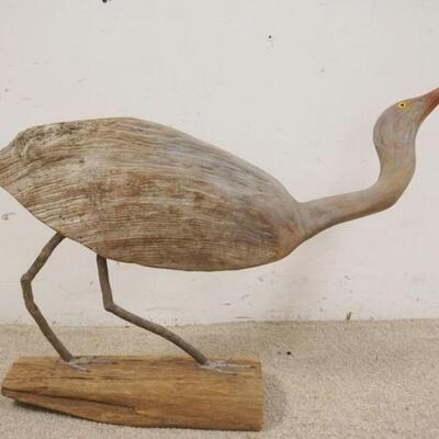 1089	LARGE SIGNED CARVED & PAINTED SHORE BIRD, GLASS EYES, HAS SIGNATURE PLAQUE ON THE BASE, NOT LEGIBLE, APPROXIMATELY 35 IN LONG X 22...