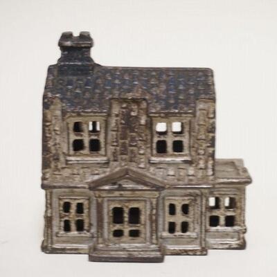1055	HOUSE STILL BANK, SILVER & BLUE DECORATION, CAST IRON, 3 7/8 IN X 4 1/4 IN HIGH
