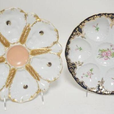 1072	2 HAND PAINTED OYSTER PLATES, ONE HAS A RAISED STAR ON THE BASE-9 1/2 IN, OTHER IS MARKED LIMOGES W/CROWN & CROSSED SWORDS-8 3/4 IN
