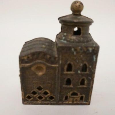1020	BUILDING W/TOWER STILL BANK, GOLD DECORATION, CAST IRON, 2 5/8 IN WIDE X 3 3/4 IN HIGH
