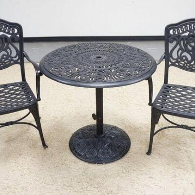 1086	3 PIECE CAST METAL PATIO SET, 2 ARM CHAIRS & 30 IN ROUND TABLE THAT CAN HOLD AN UMBRELLA
