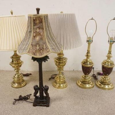1099	GROUP OF 5 TABLE LAMPS, 4 ARE BRASS, ONE FEATURES LIONS CLAWING A TREE, TALLEST IS 31 IN
