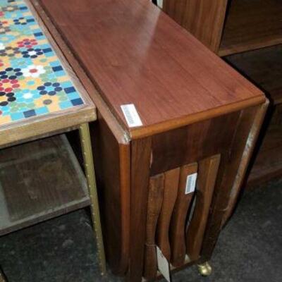 #2038 â€¢ Leaf Drop Table With Four Chairs: Opened Measures Approx 62"x34"x29" Closed Measures Approx 13"x34"x29