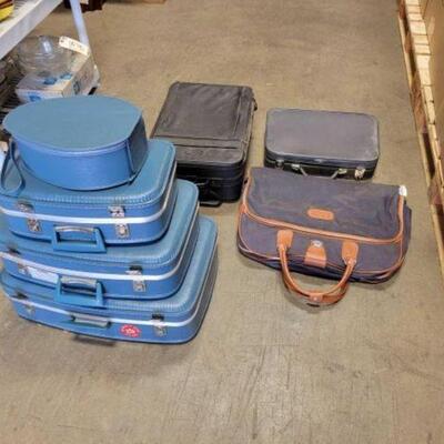 #3208 â€¢ 5 Suit Cases, Hat Case, And Brief Case