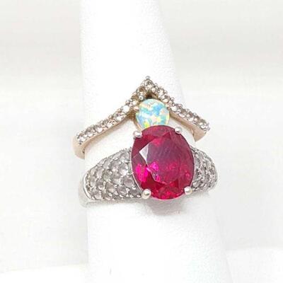 202: 2 10k Fashion Rings, 6.5g
Weighs Approx: 6.7g Ring Sizes: Includes Ruby Ring 7 & 8.5