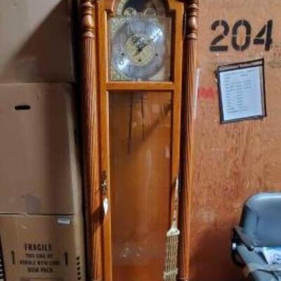 #2104 â€¢ Howard Miller Grandfather Clock Measures Approx 19.5"x12"x84"