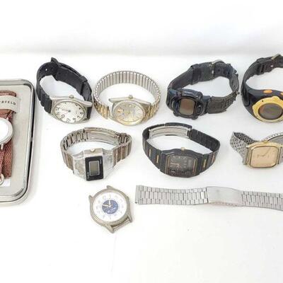 366: Assortment of 9 Men's Wrist Watches
Includes Lagerfeld Quartz, Sharp, Timex Expedition, Survivor, Timex SSO, Seiko, St. Ives Quartz,...