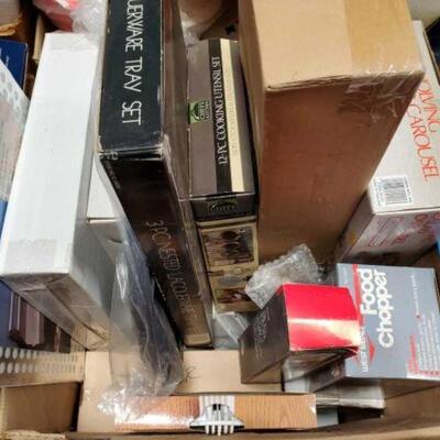 #4934 â€¢ 4 Boxes Of Misc Items Includes Coffee Maker, Flip Phone, Food Chopper, Magic Bullet, Dishware, Salad Carousel, Pitchers,...