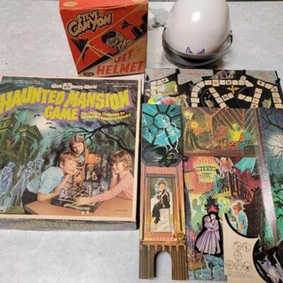 #1360 â€¢ Vintage Steve Canyon Jet Helmet and Walt Disney World Haunted Mansion Game