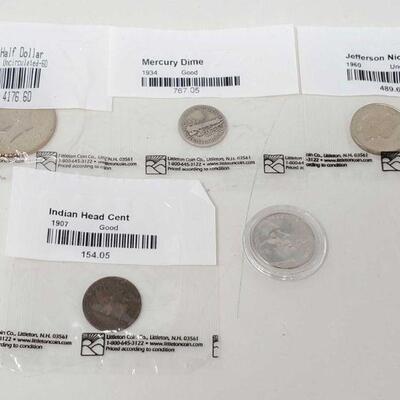 498:  Assortment of Coins
Includes 1996-P Kennedy Half Dollar, 1907 Indian Head Cent, 1934 Mercury Dime, 1960 Jefferson Nickel and 2005...