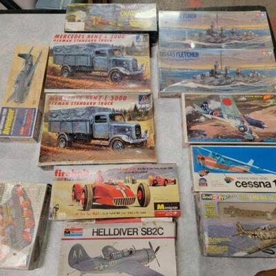 #1238 â€¢ 12 Model Planes, Tanks, Submarines, and Trucks