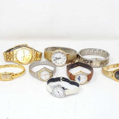 356: Assortment of 8 Wrist Watches
Includes Timex, ESQ Swiss, Timex Quartz, Carriage, Citizen Quartz, Charter Club Quartz, Timex Indiglo...