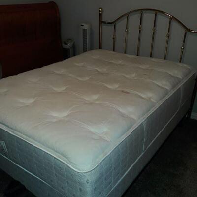 Full mattress set with brass headboard
