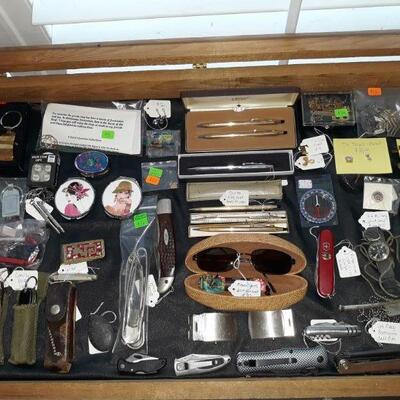 pocket knifes, Cross pens, tie tacks, and so much more.