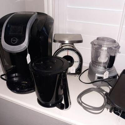 Keurig coffee maker, scale, and Cuisinart food processer