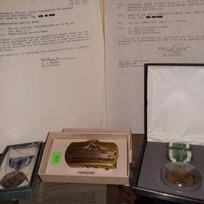 US Navy belt buckle and medals