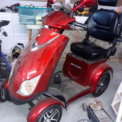 new condition electric scooter that is loaded