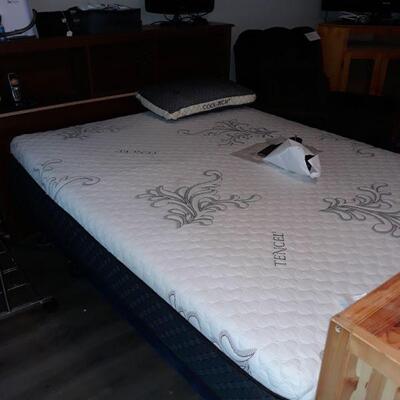 New Tencel Queen mattress on a lift platform bed. Cool Tech pillow.