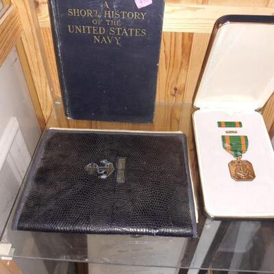 Vintage US Navy book, medal, and the fathers book of WWII documents