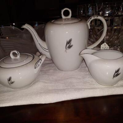 vintage porcelain teapot with matching sugar and creamer from Japan