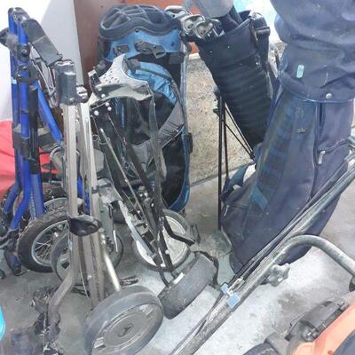 Golf bags, carts and golf clubs 