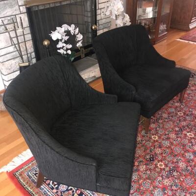  Elegant pair of Mid-Century Modern bespoke 1960s club chairs . Completely restored and reupholstered. The fabric picked is black &...