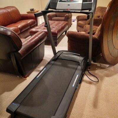 Treadmill, chairs, leather ottoman, recliner
