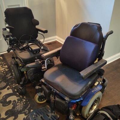 Two electric wheelchairs