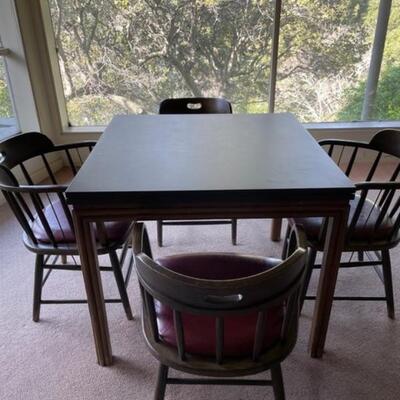 Table that easily opens to a larger table with 4 barrel chairs 36