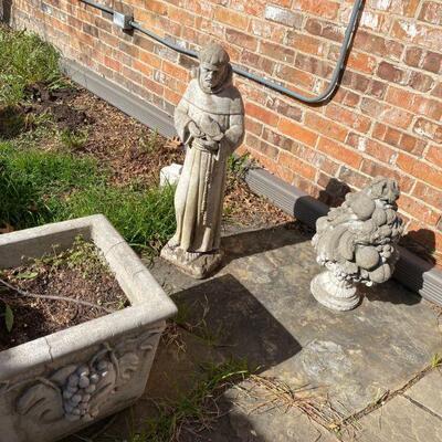 Outdoor cement pots and statues