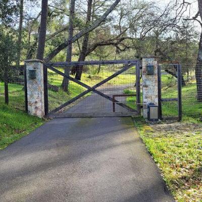 If closed this gate will open automatically as you approach. It opens toward you.