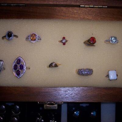Upper right, 14K Aquamarine.  5 gold rings, 5 Silver