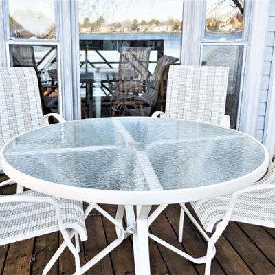 Round outdoor patio table and chairs