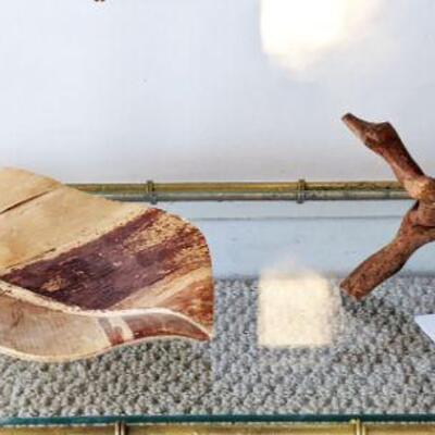carved wooden leaft and wooden stand
