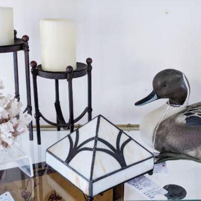 Metal contemporary candle stands, stained glass pyramid and decoy