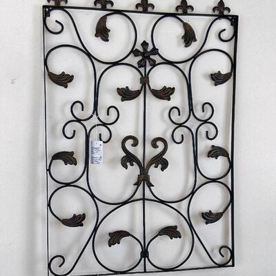 One of several pieces of wrought iron wall art