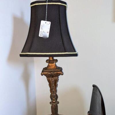 One of a pair of lamps with black shades