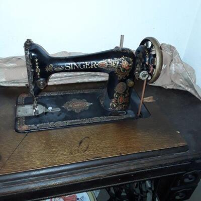 Feather Light Singer Sewing Machine in cabinet