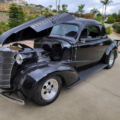 120: 1937 Chevy Coupe
VIN: HAA583117 
Has 1938 front clip, 327 Engine, 700r Transmission, Power Steering, Power Disc Brakes, Weber...