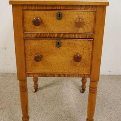 1002	ANTIQUE 2 DRAWER STAND W/TIGER & BIRDSEYE MAPLE FRONT & SIDE PANELS, TURNED LEGS, 16 1/2 IN WIDE X 17 1/4 IN DEEP X 30 1/4 IN HIGH
