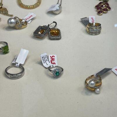 Emerald ring, diamond rings, citrine earrings, gold rings