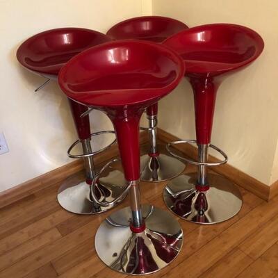 4 Red and Chrome Adjustable Height Bar Stools.