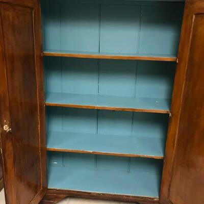 Antique cabinet with a blue interior!