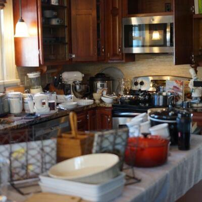 The kitchen is very full of items you can use, Caphalon and Emeril cookware, kitchenaid mixer, small appliances, Pottery Barn Pasta bowl...