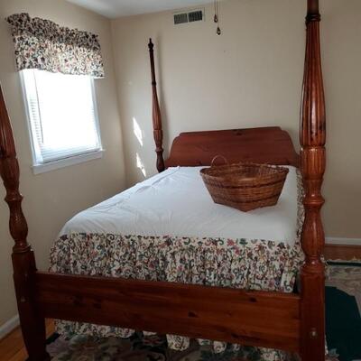 Rice carved poster bed, knotty pine, medium finish