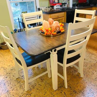 SOLID WOOD DINING TABLE WITH TURN DOWN LEAFS, AND 4 LADDER BACK CHAIRS ONLY 1.5 YEARS OLD