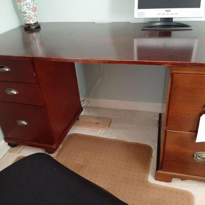 Desk measures 57 inches long. 28 inches wide and 28 1/2 inches tall. 3 pieces. 5 drawers 