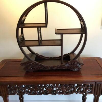 Rosewood Moon Curio Stand. Width of Base is 22.75in,  Diameter approx. 22.5in  and Height is approx. 24in.