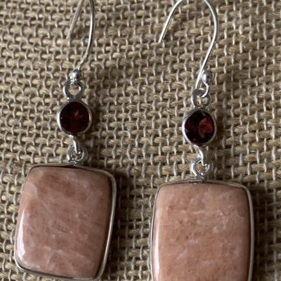 Sterling Silver Dangle Earrings with Garnets and
Polished Stones